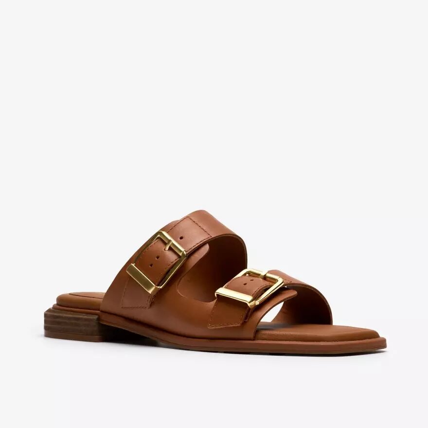 Ariany Bay – platta sandaler i brunt läder för damer Ariany Bay – platta sandaler i brunt läder för damer