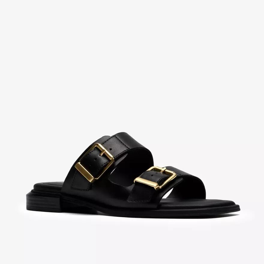 Ariany Bay – platta sandaler i svart läder för damer Ariany Bay – platta sandaler i svart läder för damer