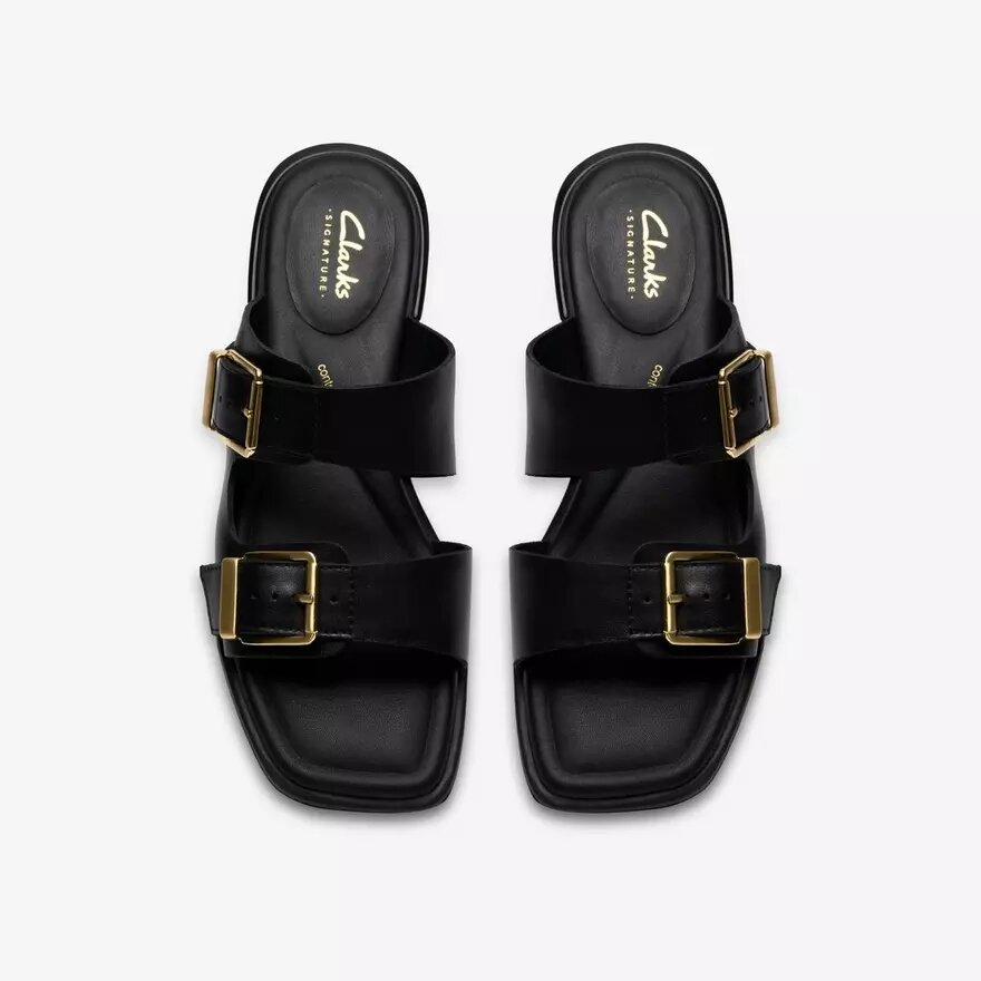 Ariany Bay – platta sandaler i svart läder för damer Ariany Bay – platta sandaler i svart läder för damer