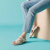 Cecily Strap – rem-sandaler i krämfärgat läder för damer