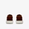 Goswell Tie sneakers i brunt läder för herr Goswell Tie sneakers i brunt läder för herr