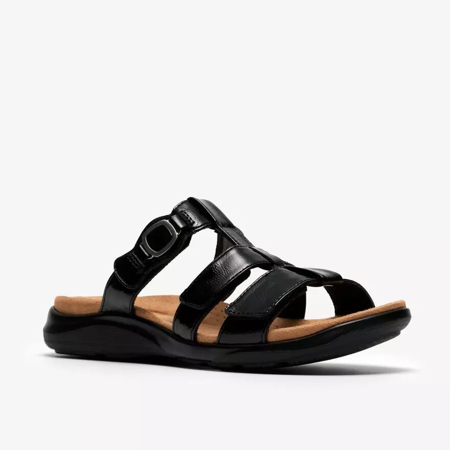 Kitly Pearl – svarta platta sandaler i lackläder för damer Kitly Pearl – svarta platta sandaler i lackläder för damer