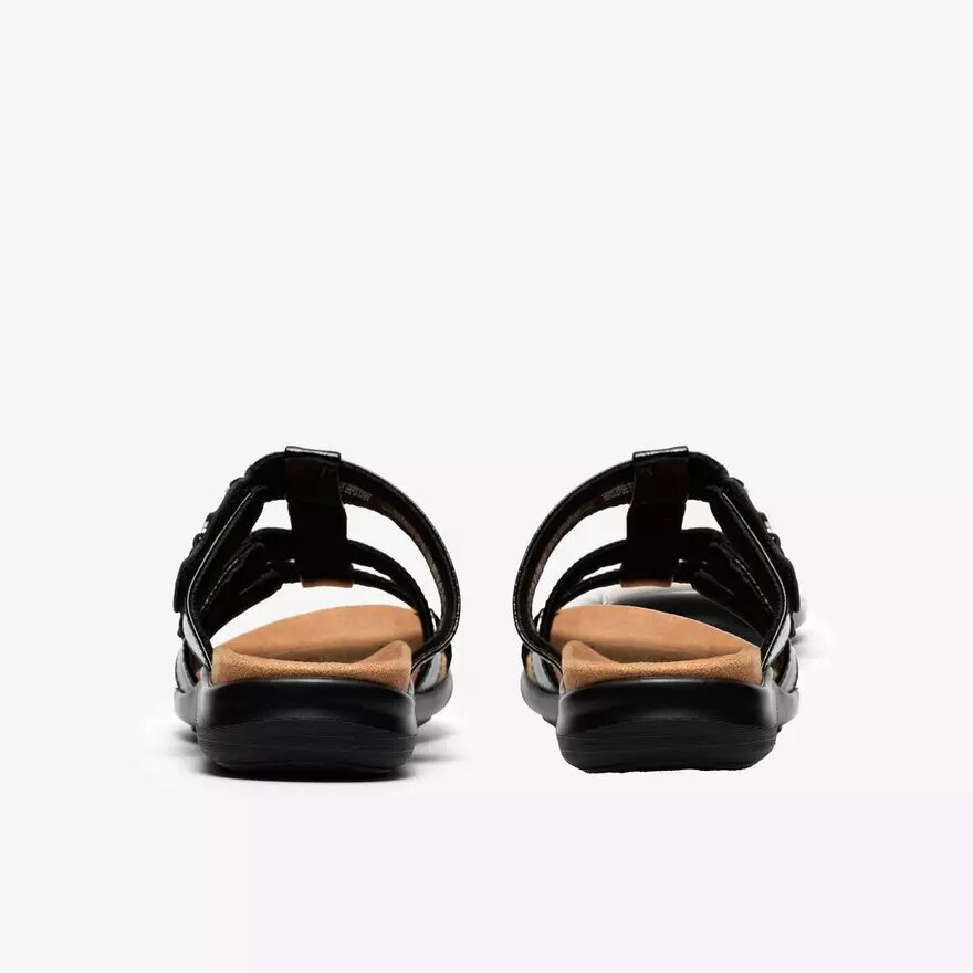 Kitly Pearl – svarta platta sandaler i lackläder för damer Kitly Pearl – svarta platta sandaler i lackläder för damer
