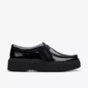 Torhill Bee svart lack Wallabee för dam Torhill Bee svart lack Wallabee för dam