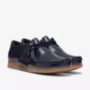 Wallabee Big Kid för pojkar, marinblå lackade Wallabees Wallabee Big Kid för pojkar, marinblå lackade Wallabees