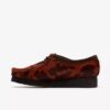 Wallabee för dam. Bruna Wallabees med ko-mönster Wallabee för dam. Bruna Wallabees med ko-mönster